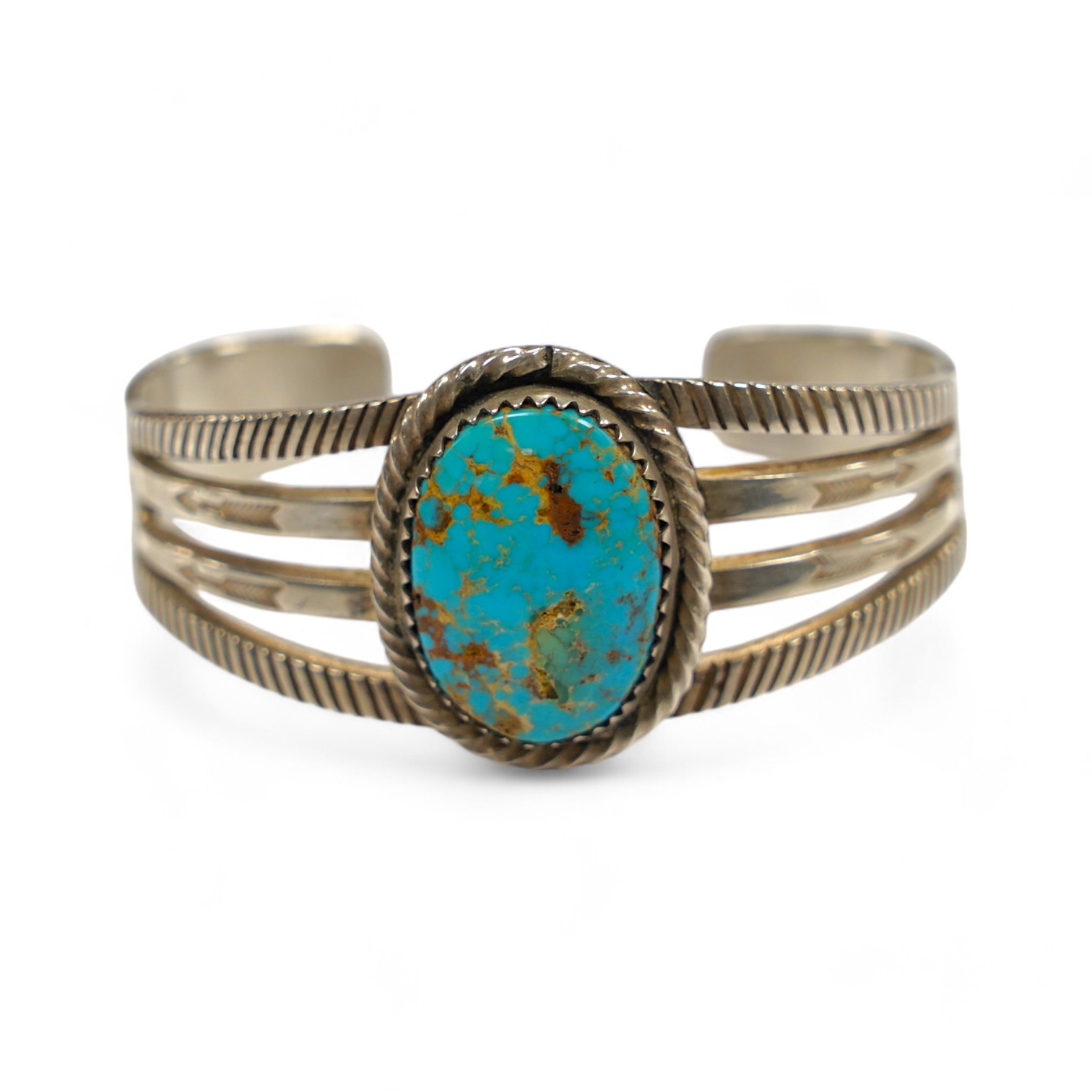 A Navaho? turquoise set white metal open bangle. Condition - fair